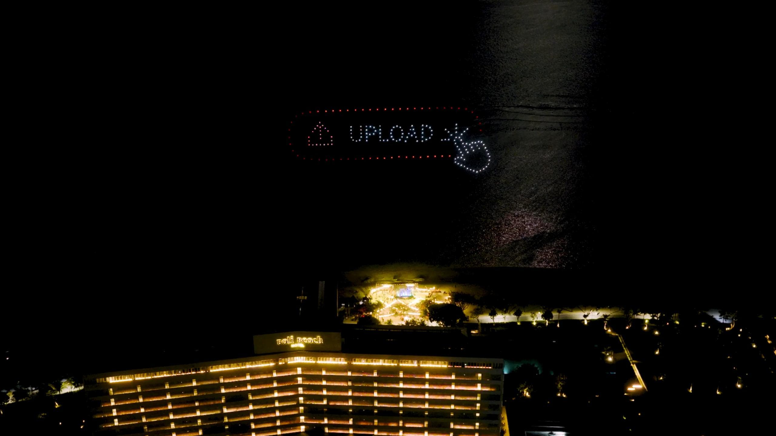 Upload button and cursor formation above The Meru Sanur at YouTube Creator Summit 2026
